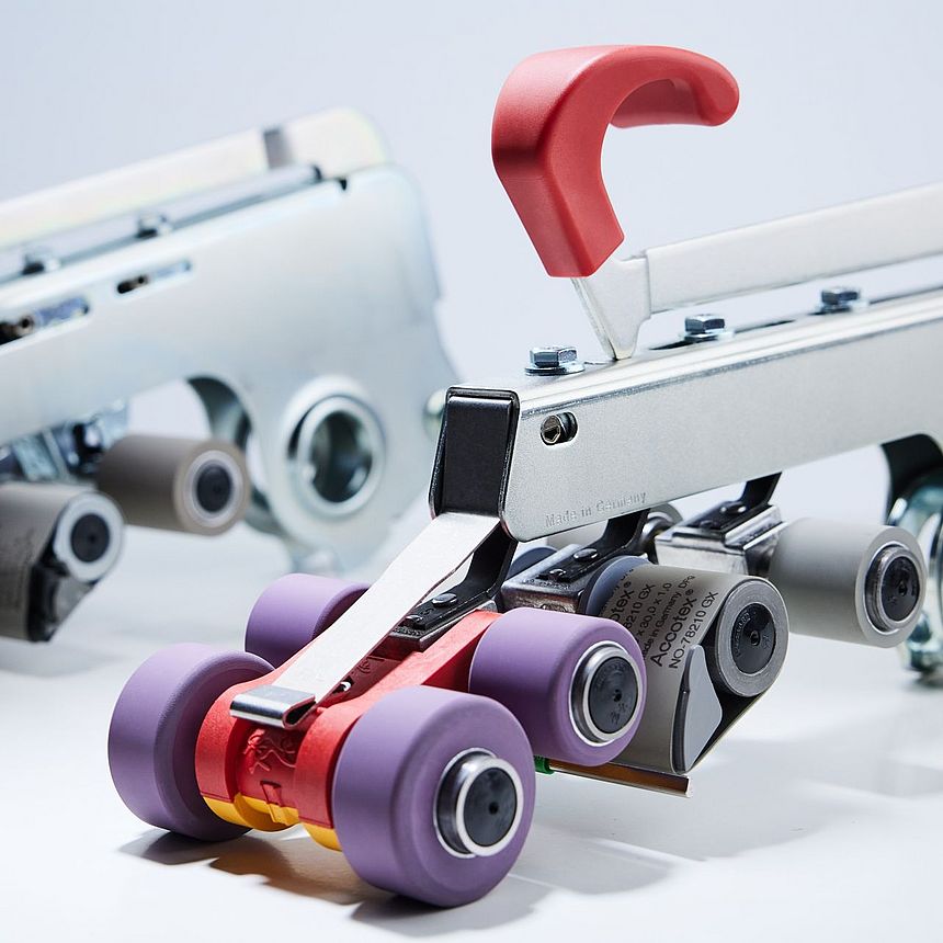 Suessen top weighting arms